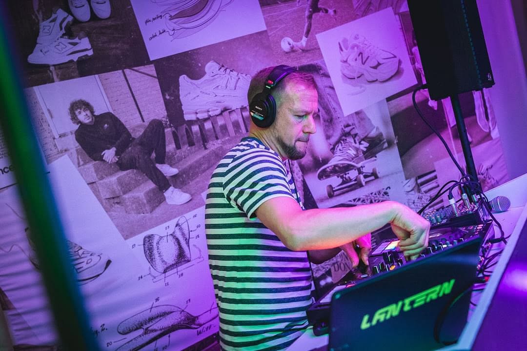 DJ Lantern mixing live under club lighting